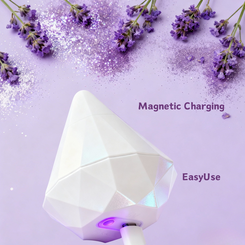 Side view of the pearl white diamond stimulator connected to its magnetic charger, showcasing the easy-to-use and hassle-free charging system for reliable power.