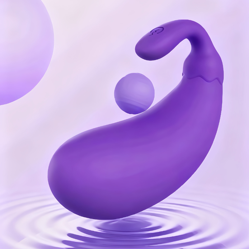 The purple mini eggplant vibrator suspended above water, with its base touching the surface, visually highlighting its waterproof feature for easy cleaning and bath-time fun.